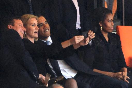 Obama, Schmitt, Cameron take selfie at Mandela funeral.